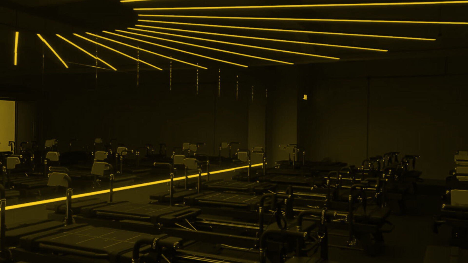 The Core Precinct Experience - Modern studio with architectural gold lighting